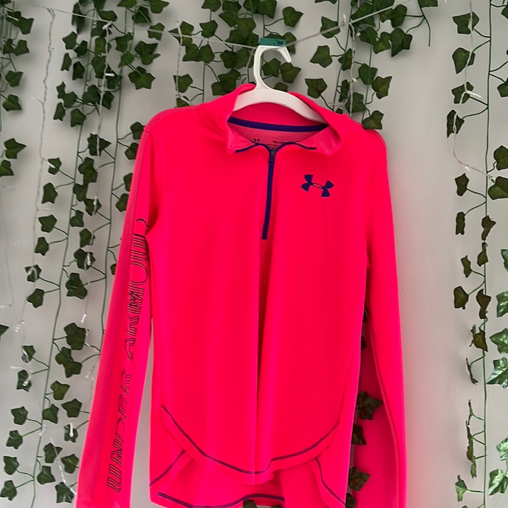 I am selling a bright pink Under Armour fitted piece of clothing.